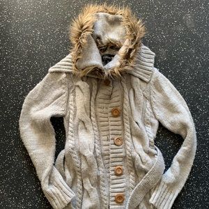 Grey button down sweater.